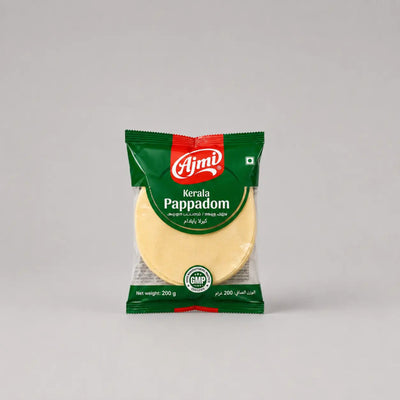 Packaged Kerala Pappadom with Ajmi branding on a gray background