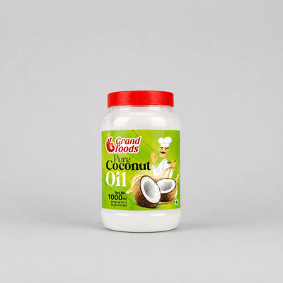 Jar of Grand Foods Pure Coconut Oil with a red lid on a gray background