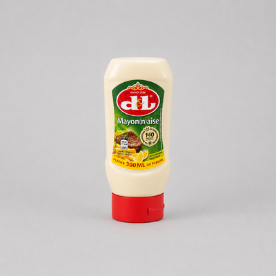 A squeeze bottle of dl Mayonaise mayonnaise, 300 ml, featuring a cream-colored plastic bottle with a red cap and a green and red label, set against a plain light gray background.