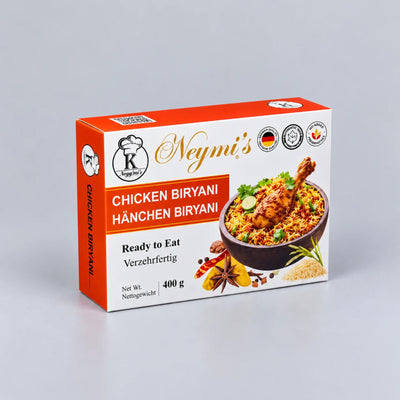 A 400g box of Neymi's Chicken Biryani Hänchen Biryani, featuring a white and orange packaging design with a photo of the prepared biryani on the front, set against a neutral gray background.