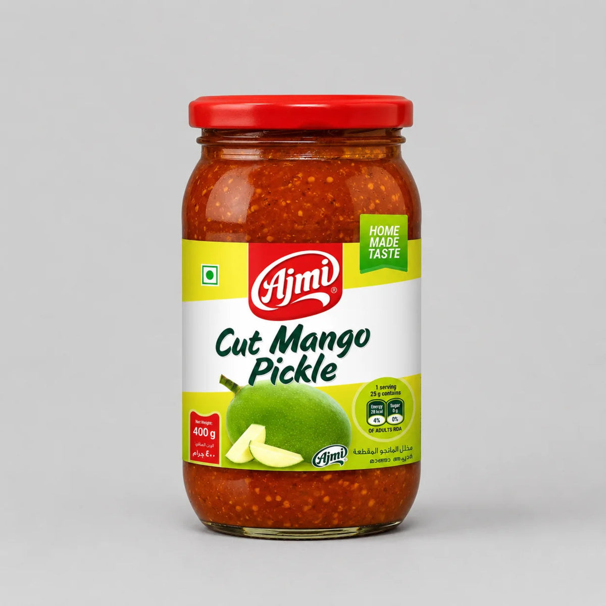 A glass jar of Ajmi Cut Mango Pickle with a red lid and a white label featuring a green mango illustration, set against a neutral gray background.