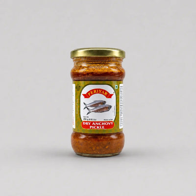 Jar of Periyar Dry Anchovy Pickle on a gray background