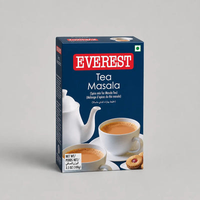 Box of Everest Tea Masala with images of tea and cookies on a gray background