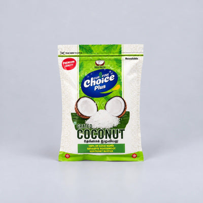 A bag of Fruit Fine's Choice Plus Grated Coconut, shown on a neutral light gray background. The packaging is primarily white with green accents, featuring a graphic of a halved coconut and white grated coconut powder.
