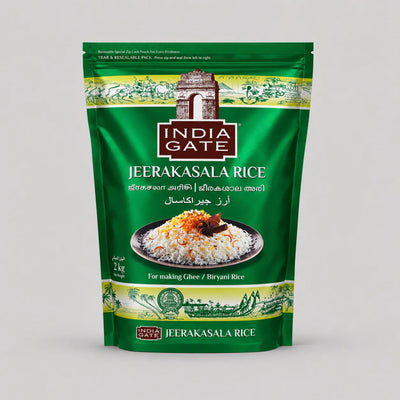 A 2 kg green stand-up pouch of India Gate Jeerakasala Rice, featuring the brand logo, product name, and an illustration of prepared rice on a light gray background.