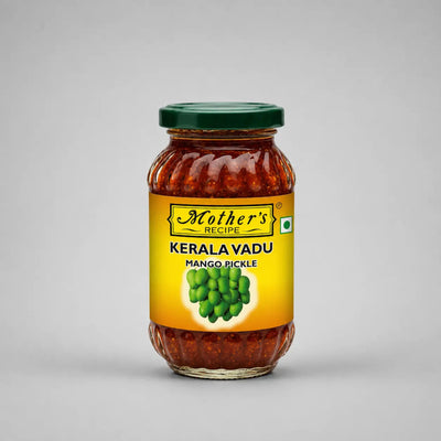 Jar of Kerala Vadu Mango Pickle with a yellow label on a gray background