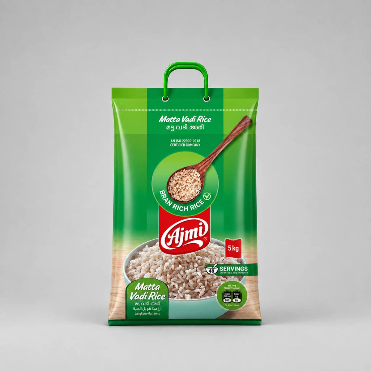 A 5 kg bag of Ajmi Matte Vadi Rice, featuring a green and white packaging design with a red Ajmi logo, a handle, and a bowl of rice pictured on the front.