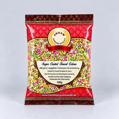 A 100g bag of Annar Premium Quality Sugar Coated Fennel Colours, featuring a red and gold patterned bag with a clear window showing the colorful sprinkles inside.