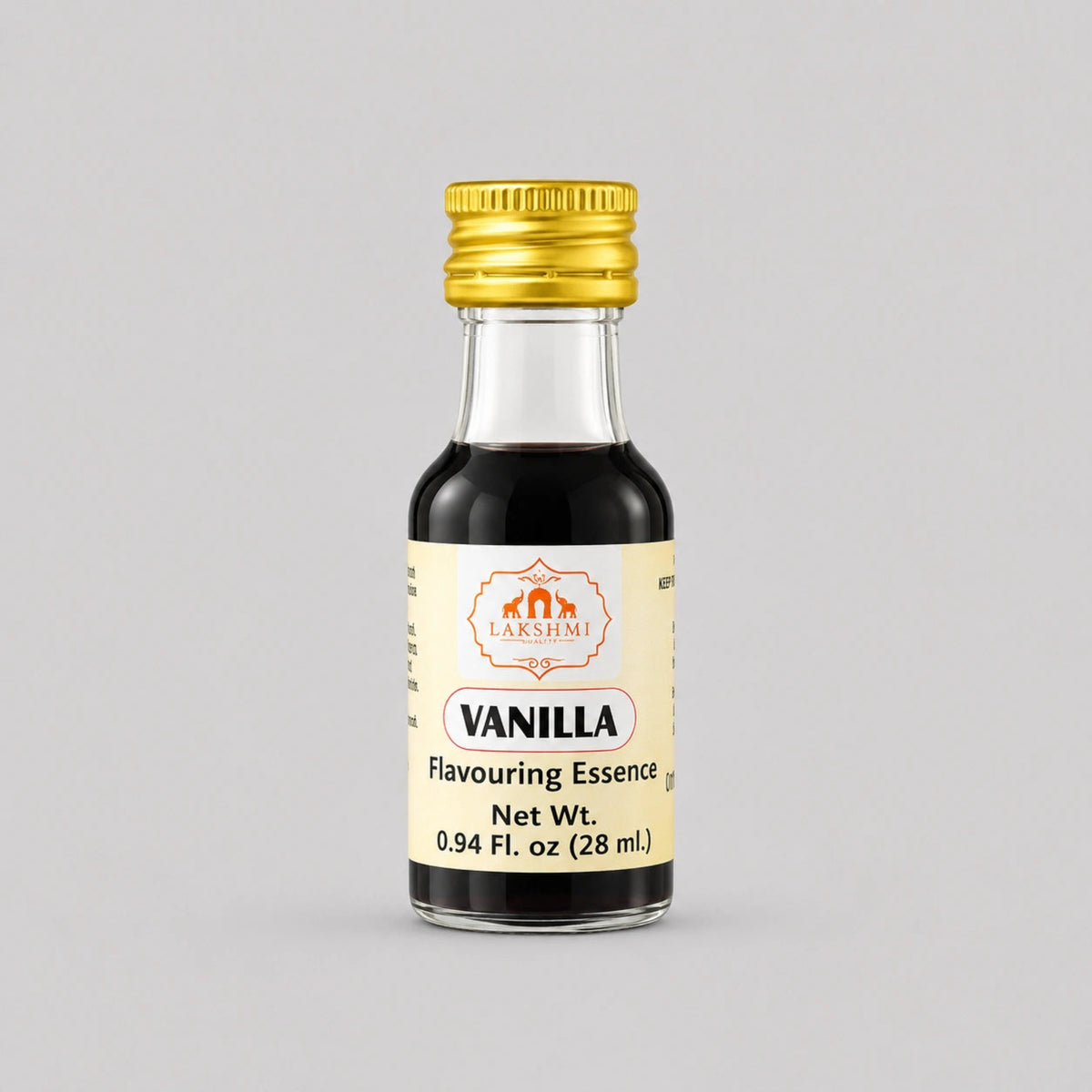 A small glass bottle of Lakeishi Vanilla Flavouring Essence with a gold cap and cream-colored label, set against a solid gray background.