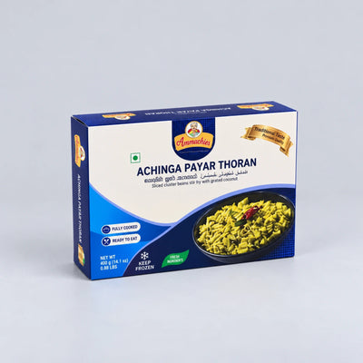 A box of Anumahia Achinga Payar Thoran (shaved clotted beans fry) on a light gray background. The packaging is blue and white with a photo of the cooked green beans dish on the front.