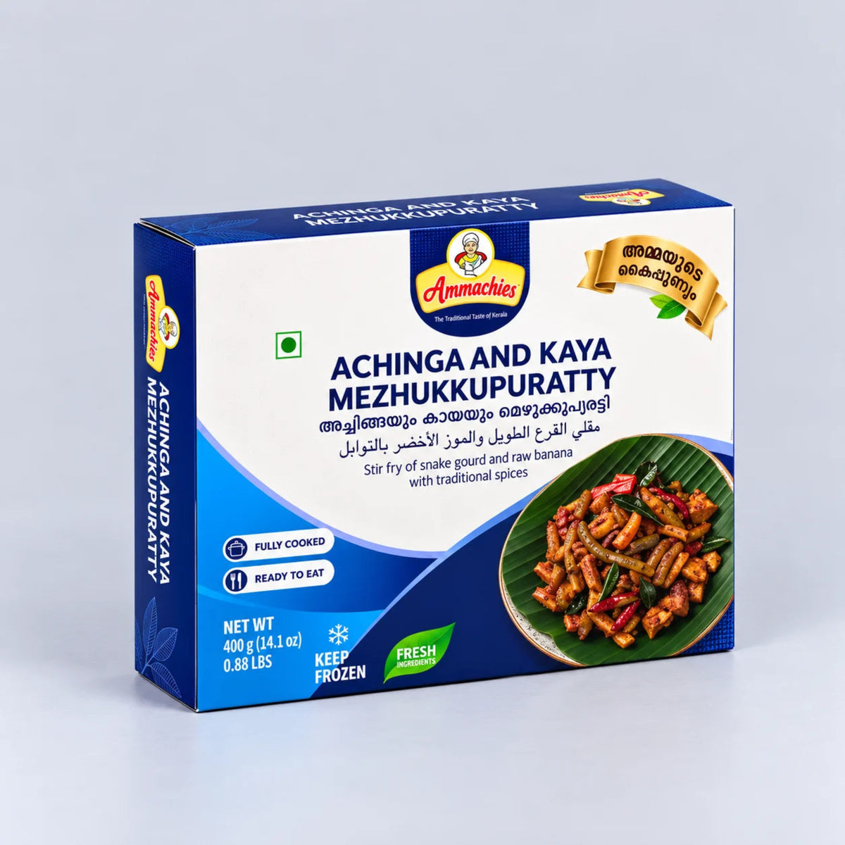 A box of Annamies Achinga and Kaya Mezhukupuratty, a frozen stir-fry snack, shown on a light gray background. The packaging is blue and white with a photo of the prepared food on a banana leaf.