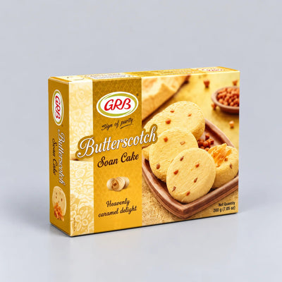 A box of GRB Butterscotch Soan Cake, featuring a golden-yellow design with an illustration of round butterscotch soan cakes on a plate, set against a neutral gray background.