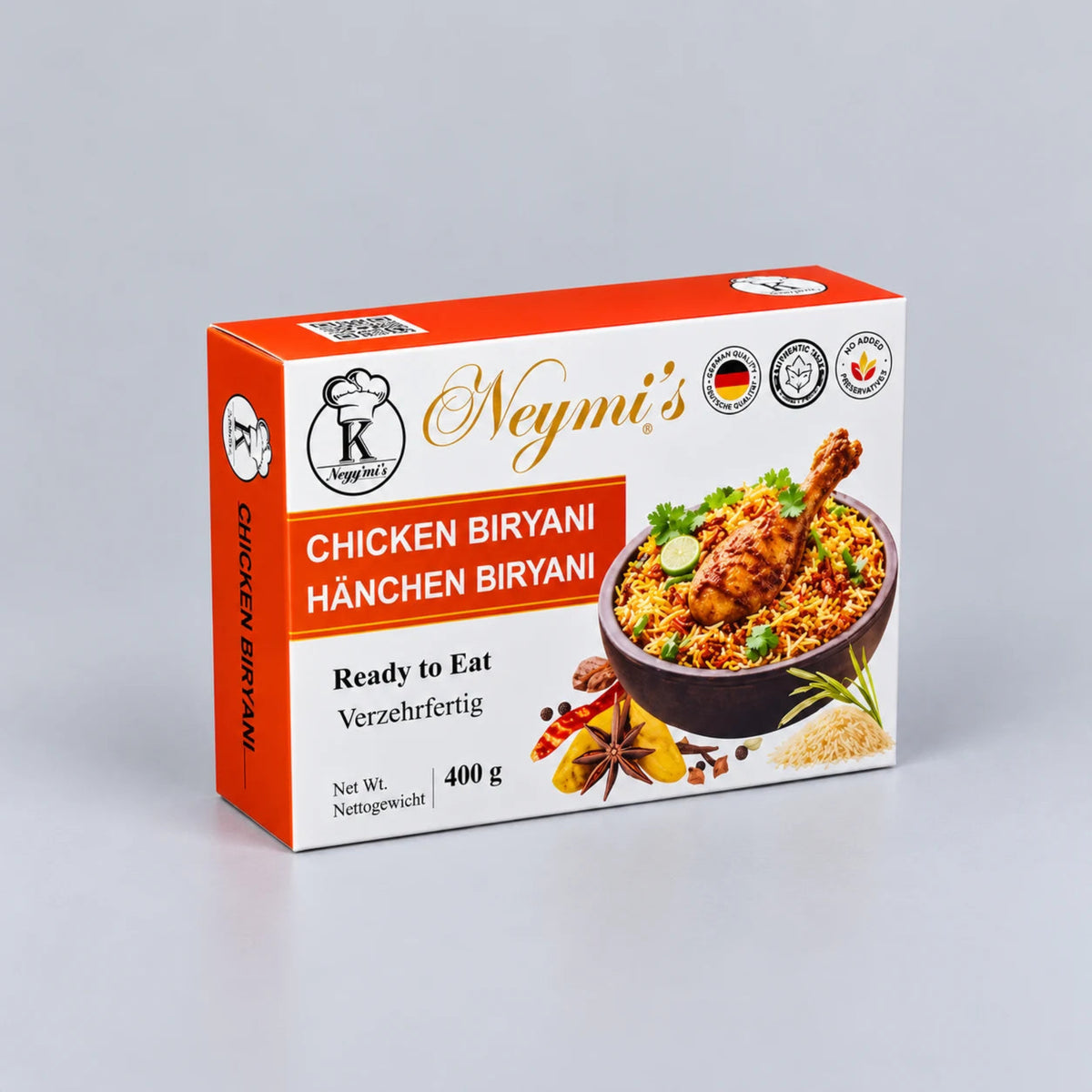 A 400g box of Neymi's Chicken Biryani Hänchen Biryani, featuring a white and orange packaging design with a photo of the prepared biryani on the front, set against a neutral gray background.