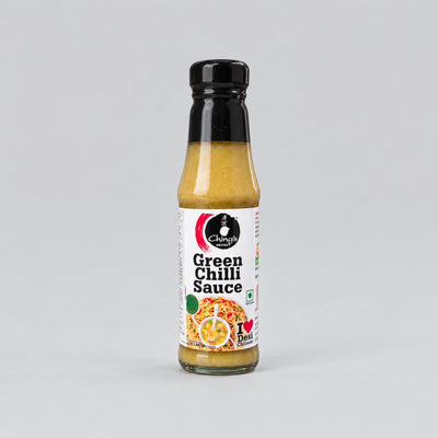 A bottle of Chunni Green Chilli Sauce with a black cap and a white label, set against a plain light gray background.