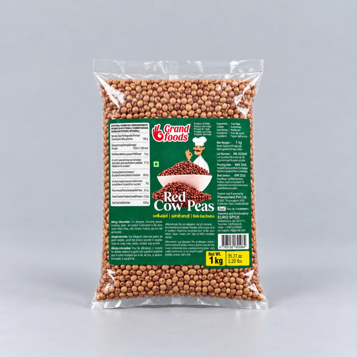 A 1 kg clear plastic bag of Grand Woods Red Cow Peas, showing the brown pea grains inside with a green and white product label, set against a neutral gray background.