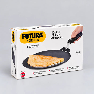 Futura Nonstick Dosa Tava (Griddle) in its original retail packaging, featuring a white box with yellow and black branding and a photo of a golden-brown dosa on the nonstick pan.