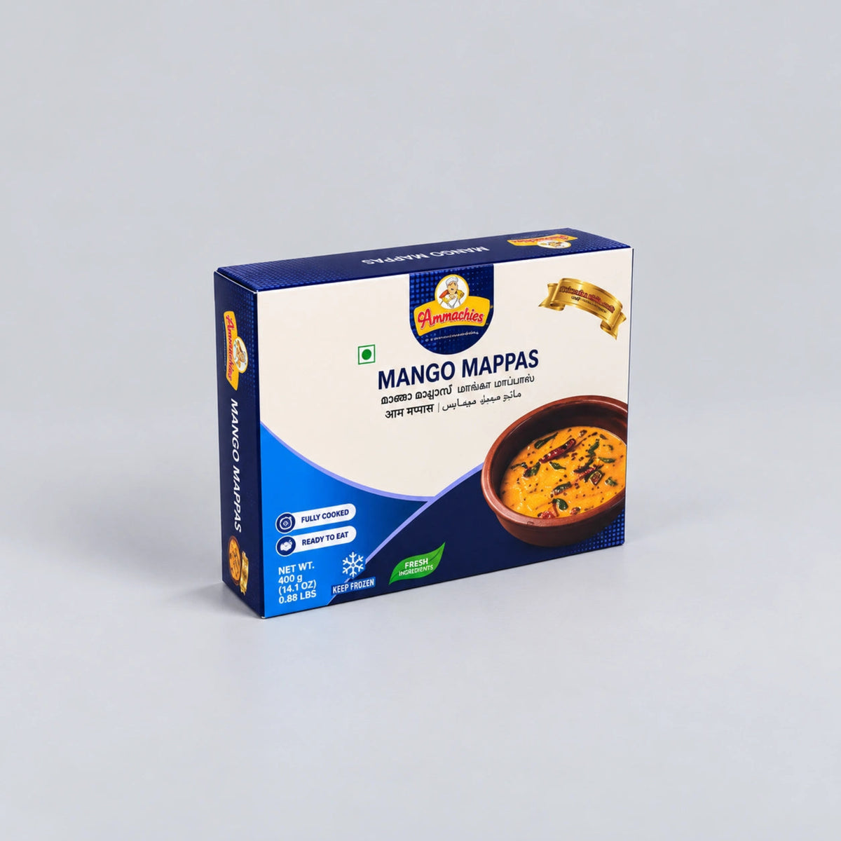 A box of Darjeesh Mango Mappas (sweet mango pancakes) on a light gray background. The packaging is primarily blue and white with a photo of the golden-brown cooked mango mappas in a bowl on the front.