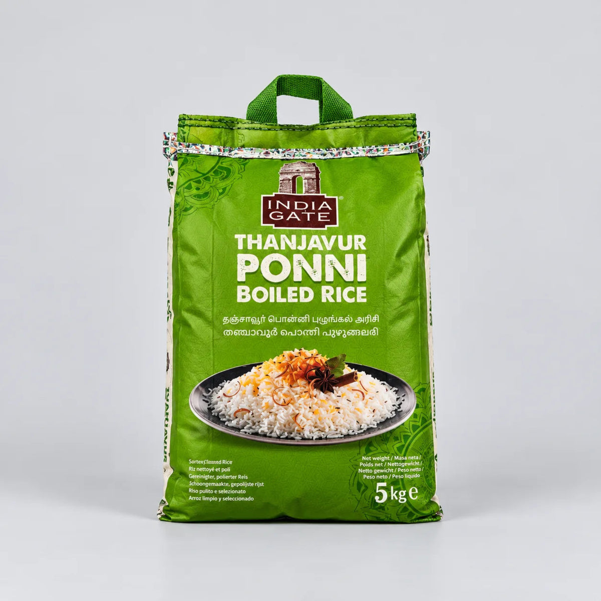 A 5 kg bag of India Gate Thanjavur Ponni Boiled Rice, featuring a bright green packaging design with a handle, product name in English and Tamil, and a photo of the prepared rice dish.