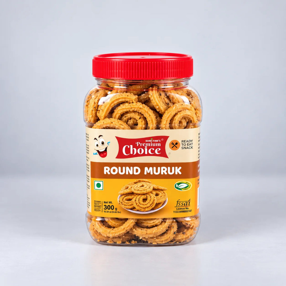 A jar of Premium Choice Round Muruk snack pieces, showing the golden-brown spiral snacks inside a clear plastic container with a red lid and a cream and brown label.