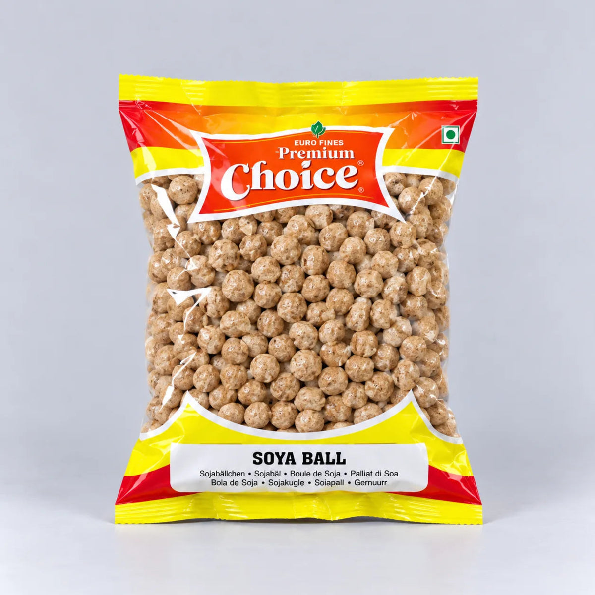 A bag of Euro Food Premium Choice Soya Ball snack, showing the light brown textured soy balls through a clear window in a yellow and red packaging, set against a neutral gray background.